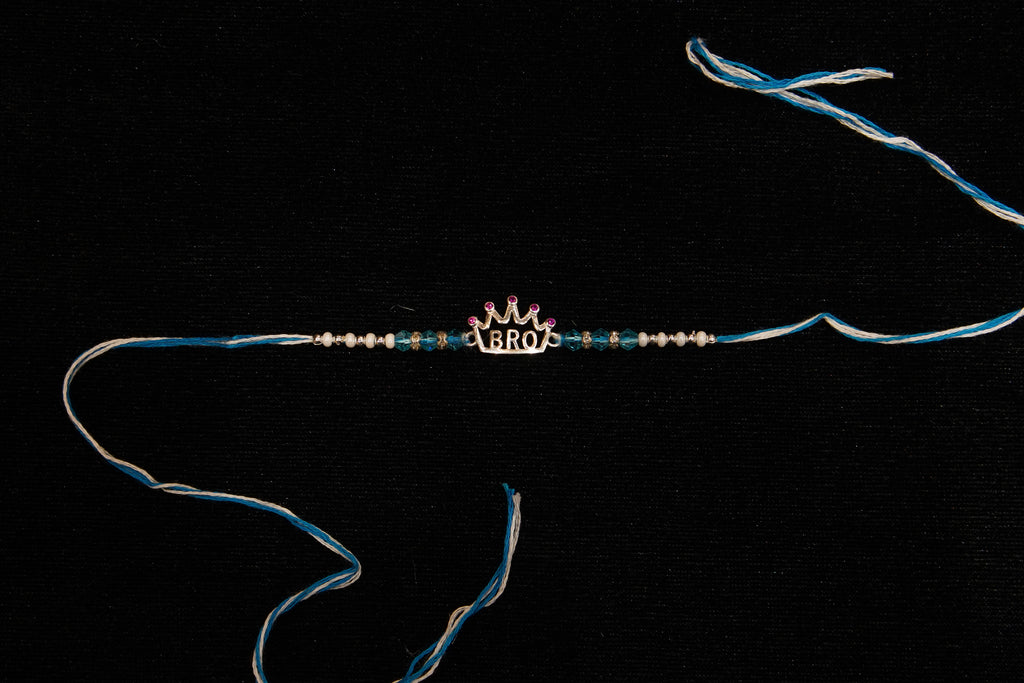 Silver Rakhi with Roli Chawal