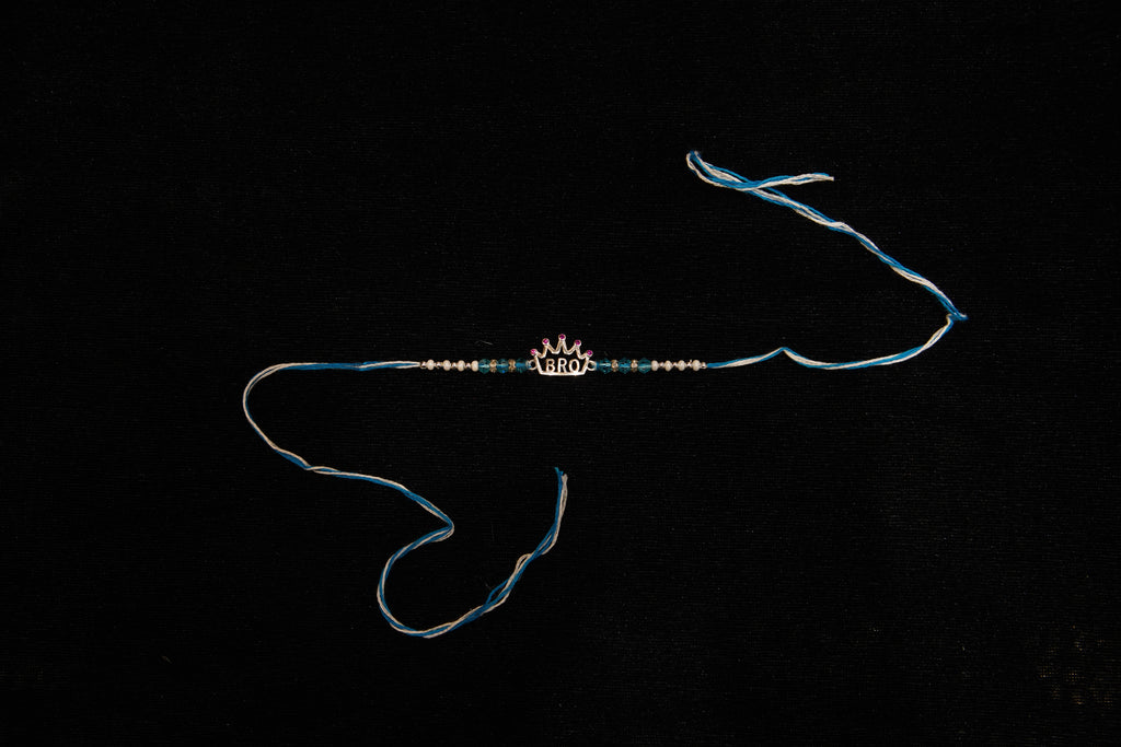 Silver Rakhi with Roli Chawal