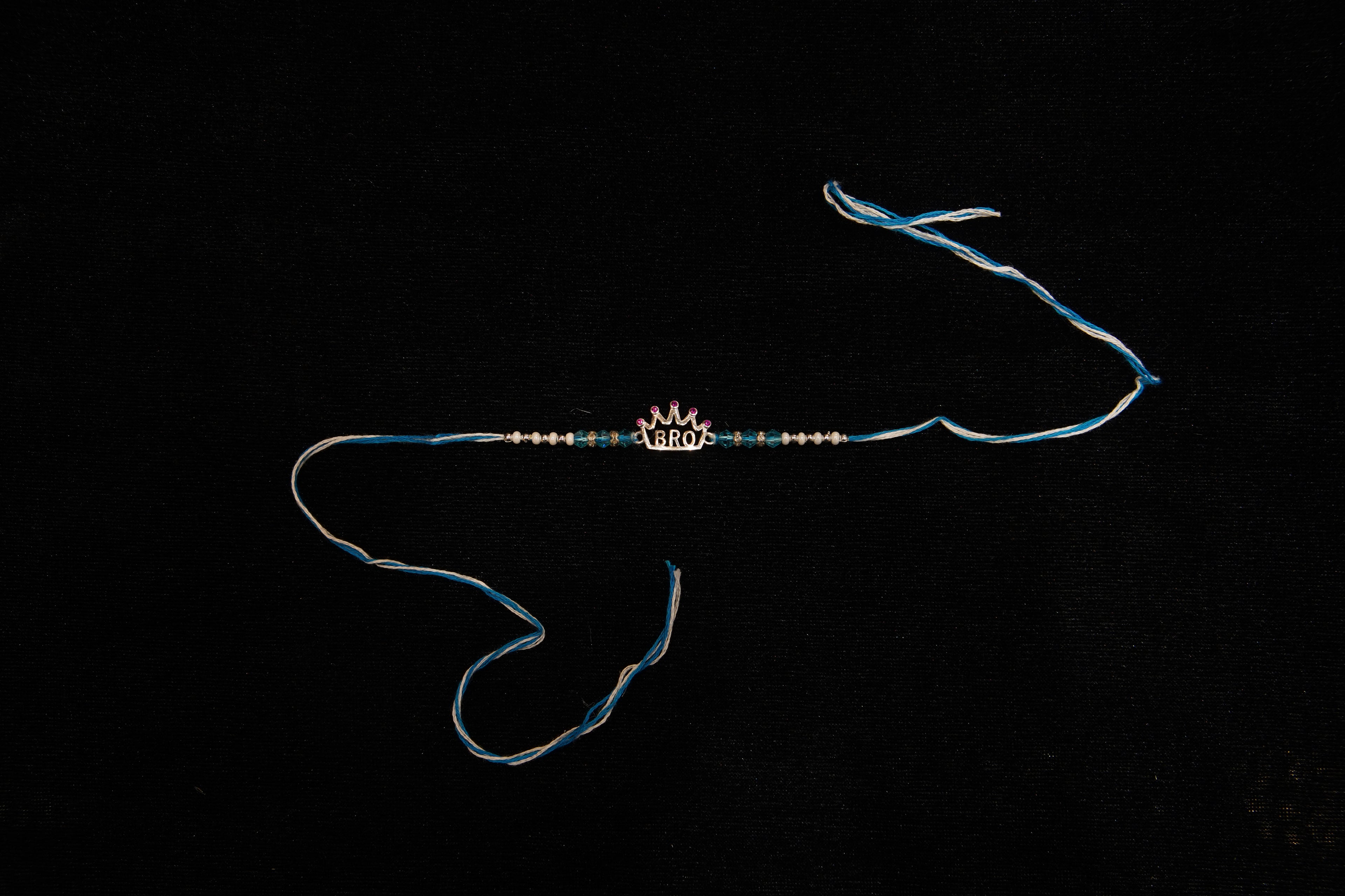 Silver Rakhi with Roli Chawal