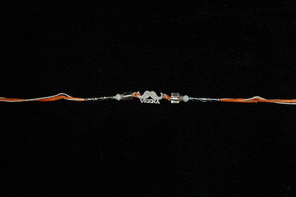 Silver Rakhi with Roli Chawal