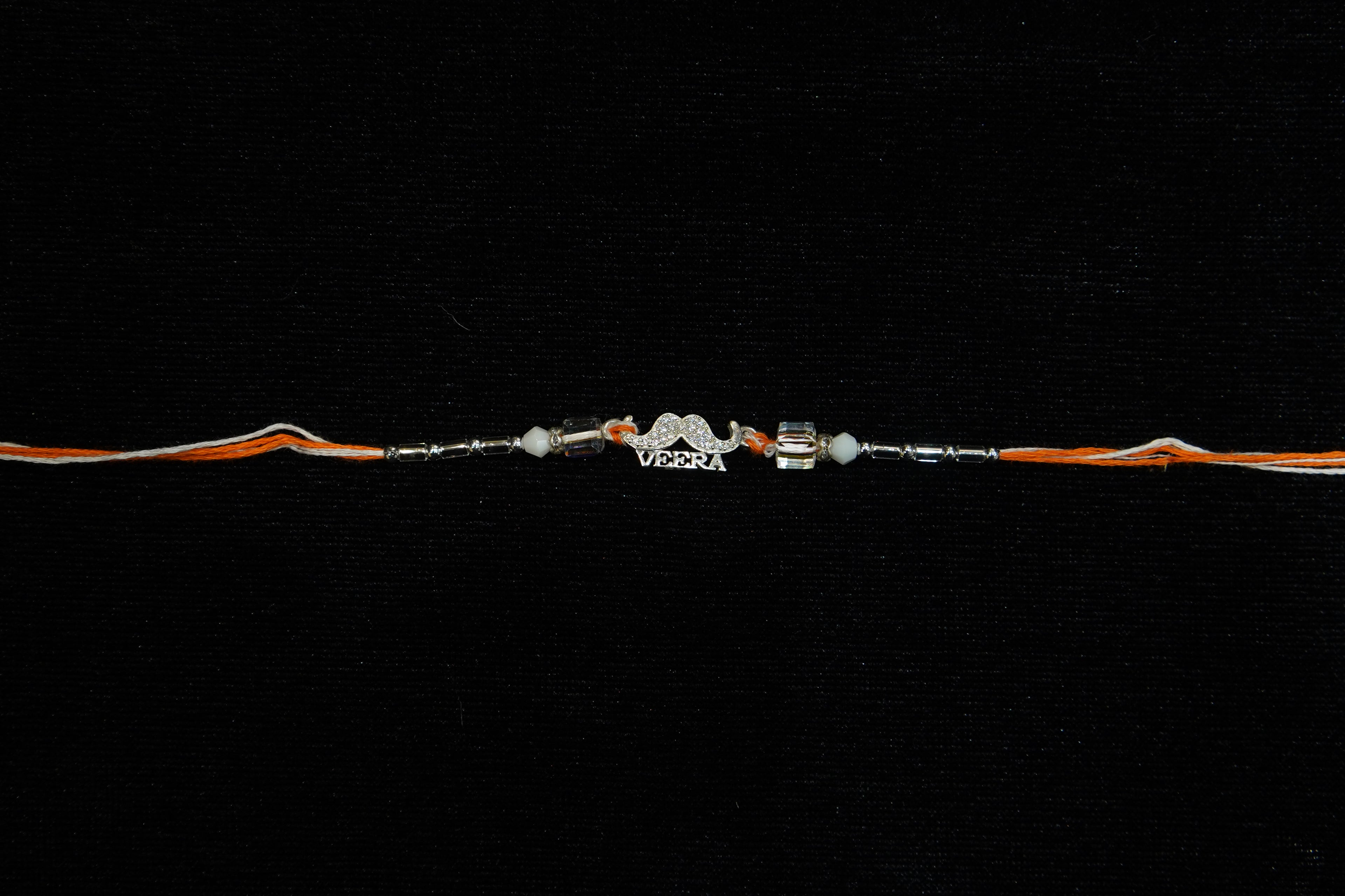 Silver Rakhi with Roli Chawal