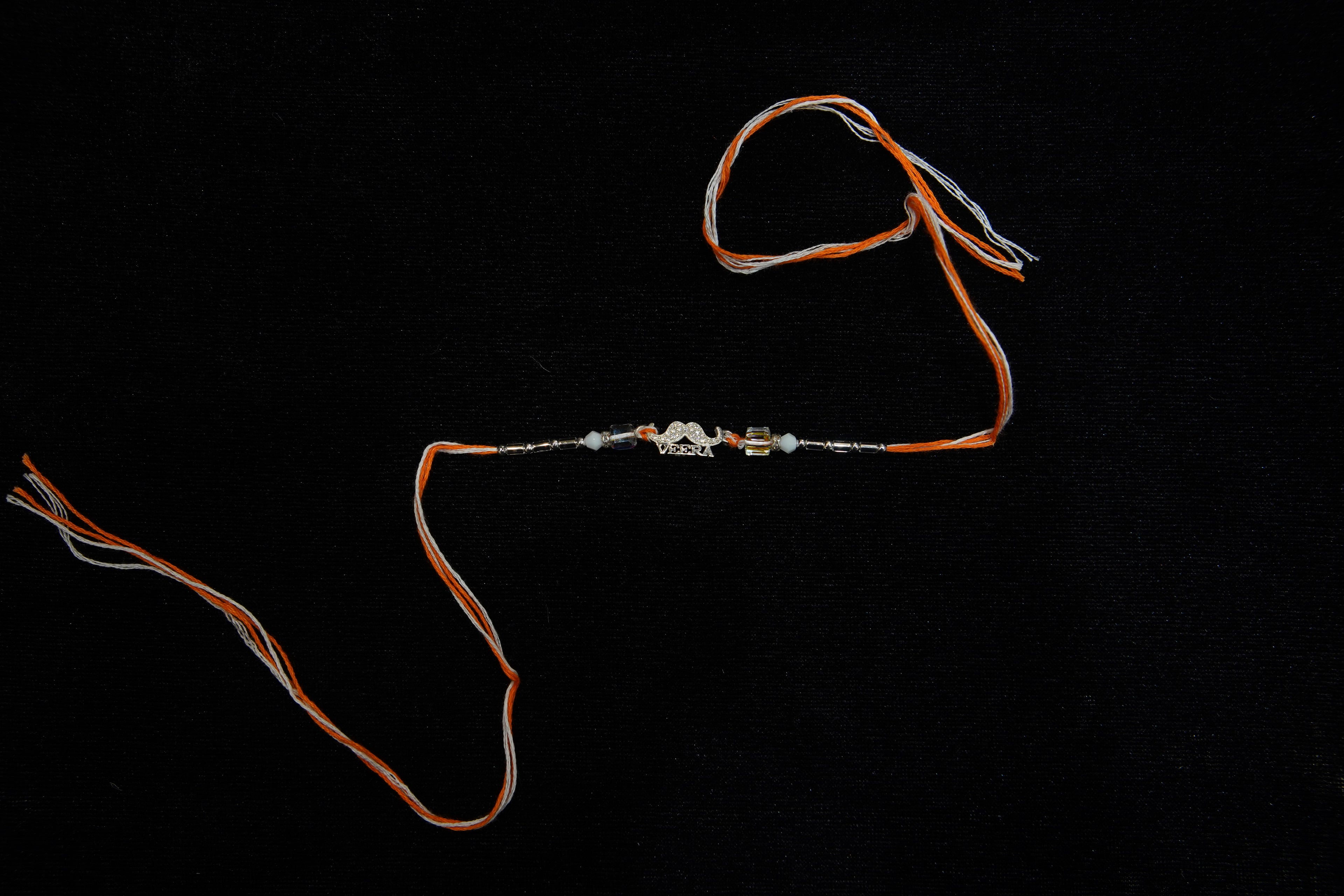 Silver Rakhi with Roli Chawal