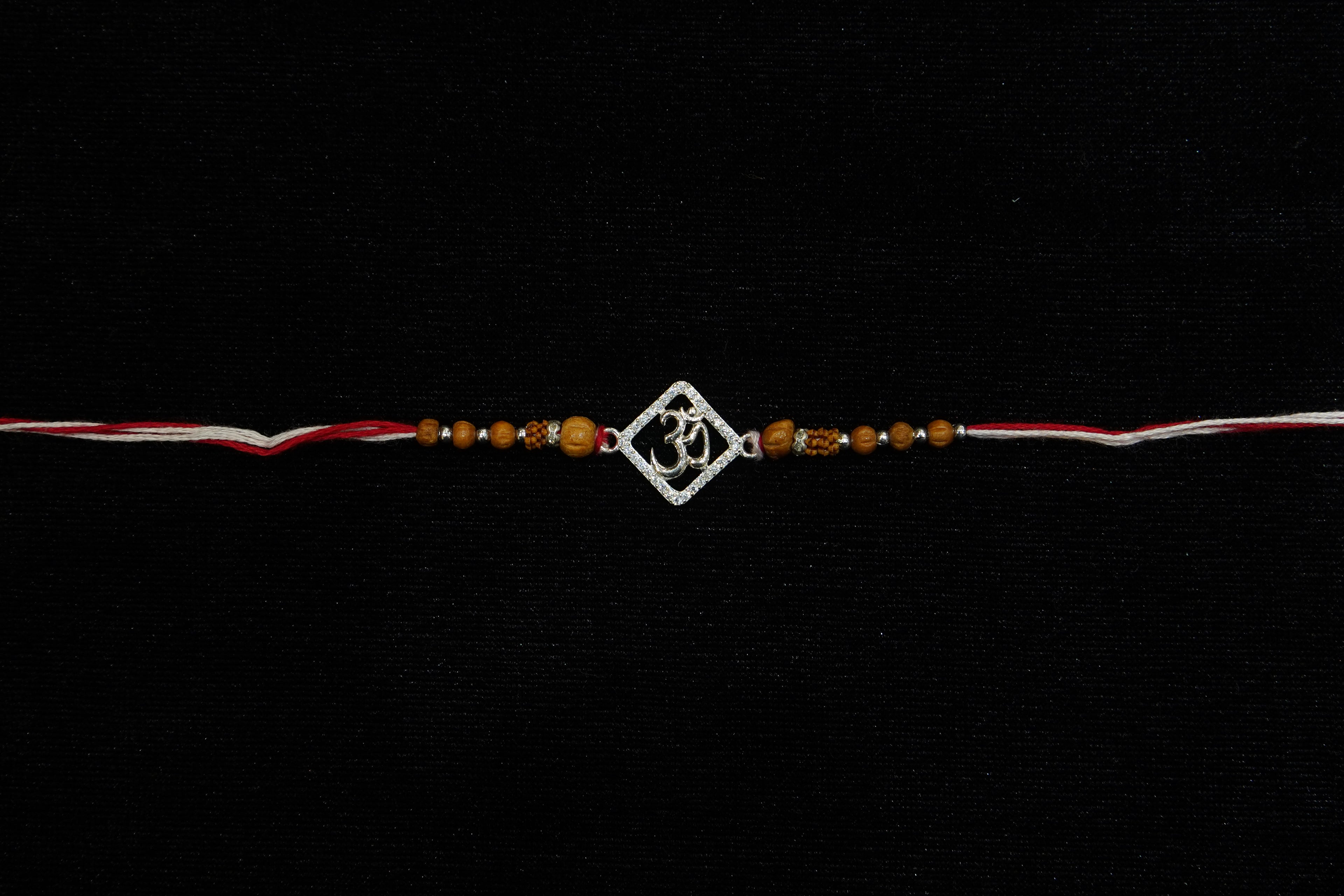 Silver Rakhi with Roli Chawal