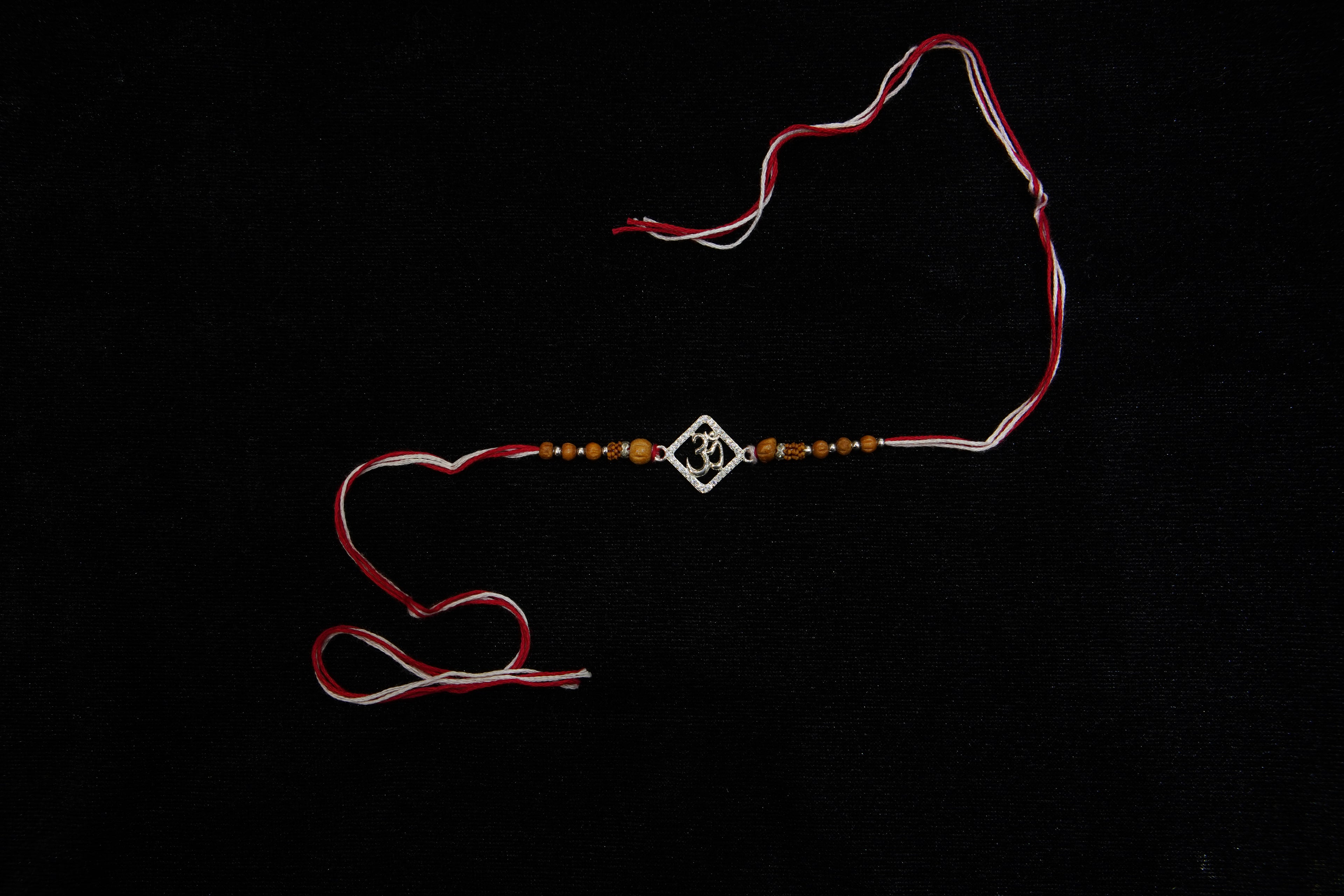 Silver Rakhi with Roli Chawal