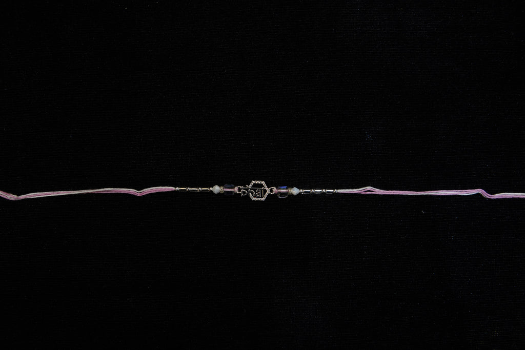 Silver Rakhi with Roli Chawal
