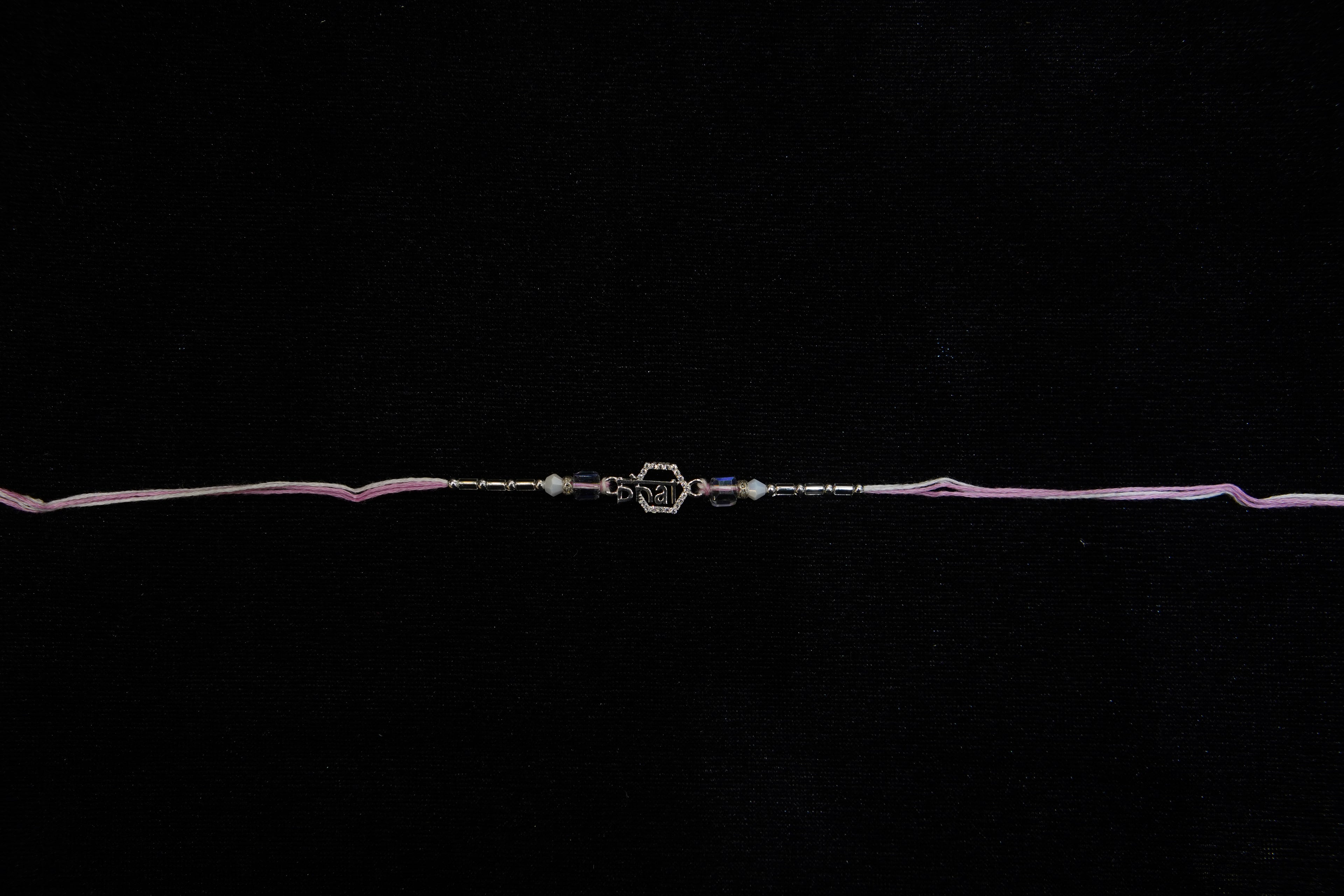 Silver Rakhi with Roli Chawal