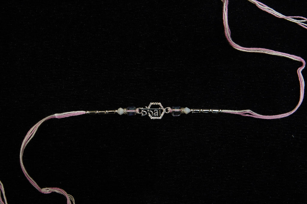 Silver Rakhi with Roli Chawal