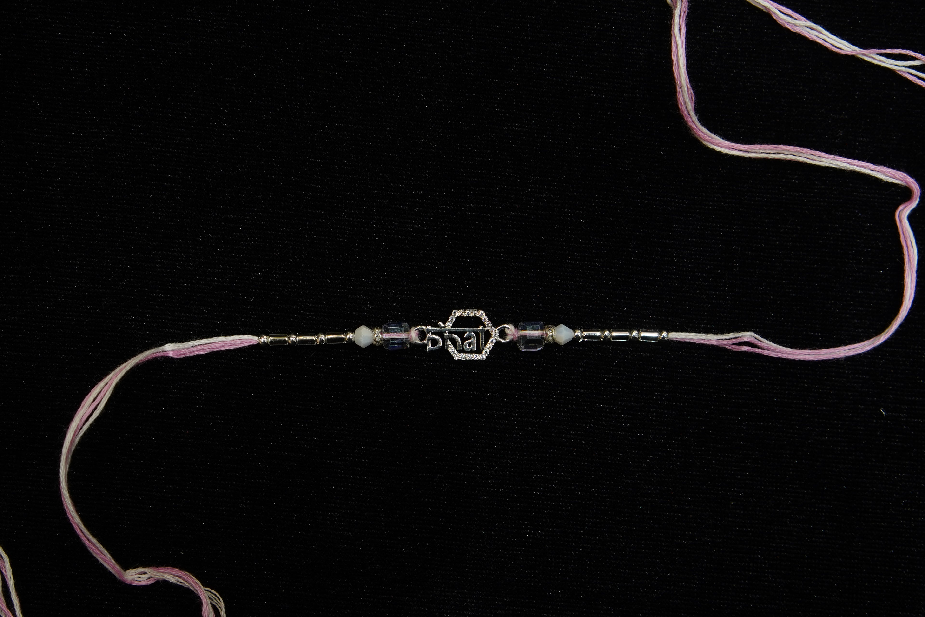 Silver Rakhi with Roli Chawal