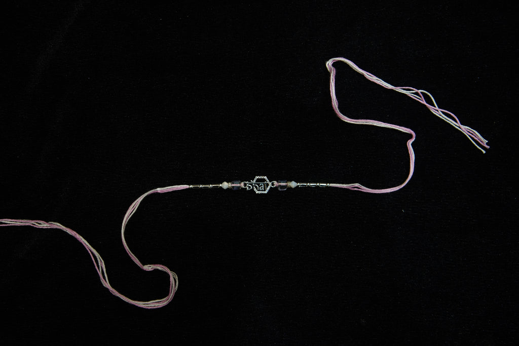 Silver Rakhi with Roli Chawal