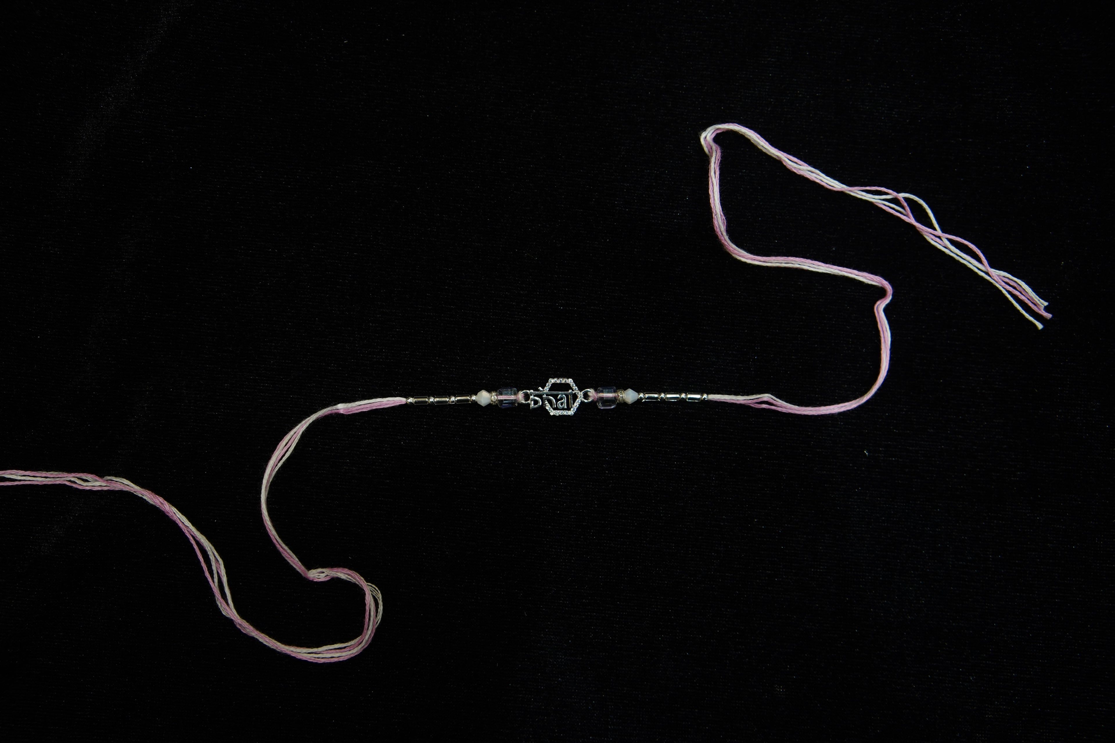 Silver Rakhi with Roli Chawal