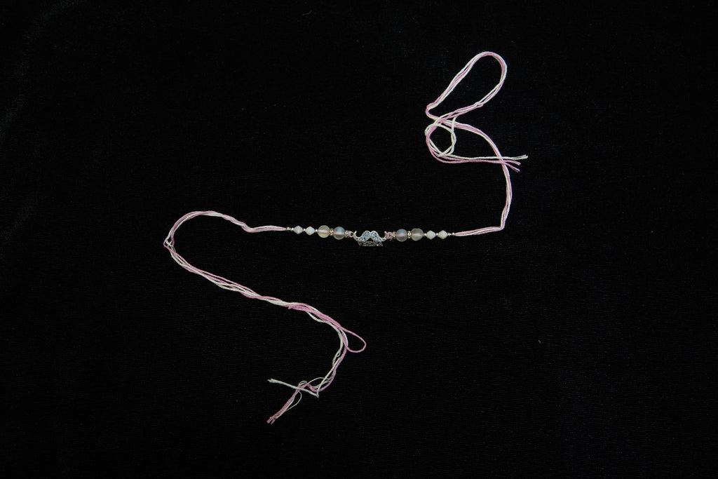 Silver Rakhi with Roli Chawal