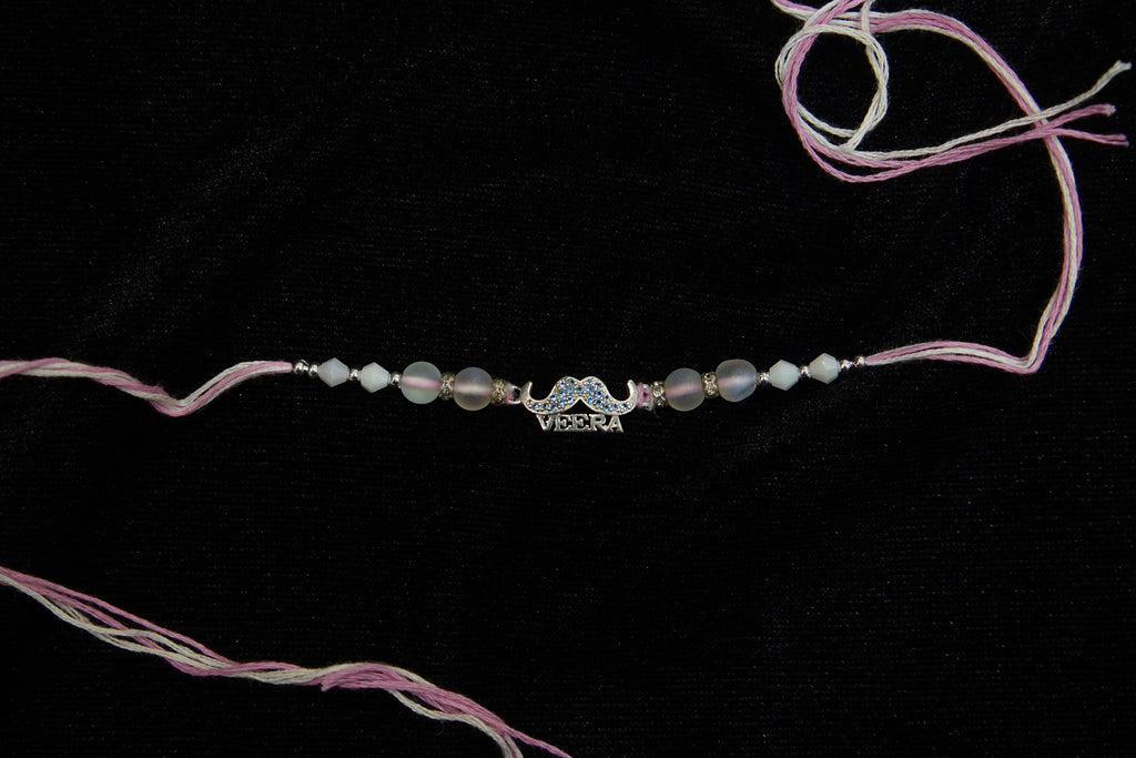 Silver Rakhi with Roli Chawal