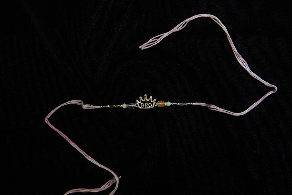 Silver Rakhi with Roli Chawal
