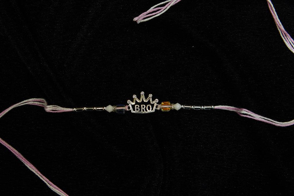 Silver Rakhi with Roli Chawal