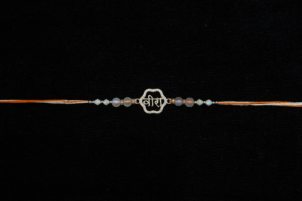 Silver Rakhi with Roli Chawal