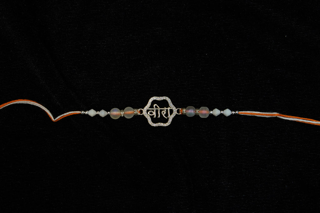 Silver Rakhi with Roli Chawal