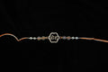Silver Rakhi with Roli Chawal