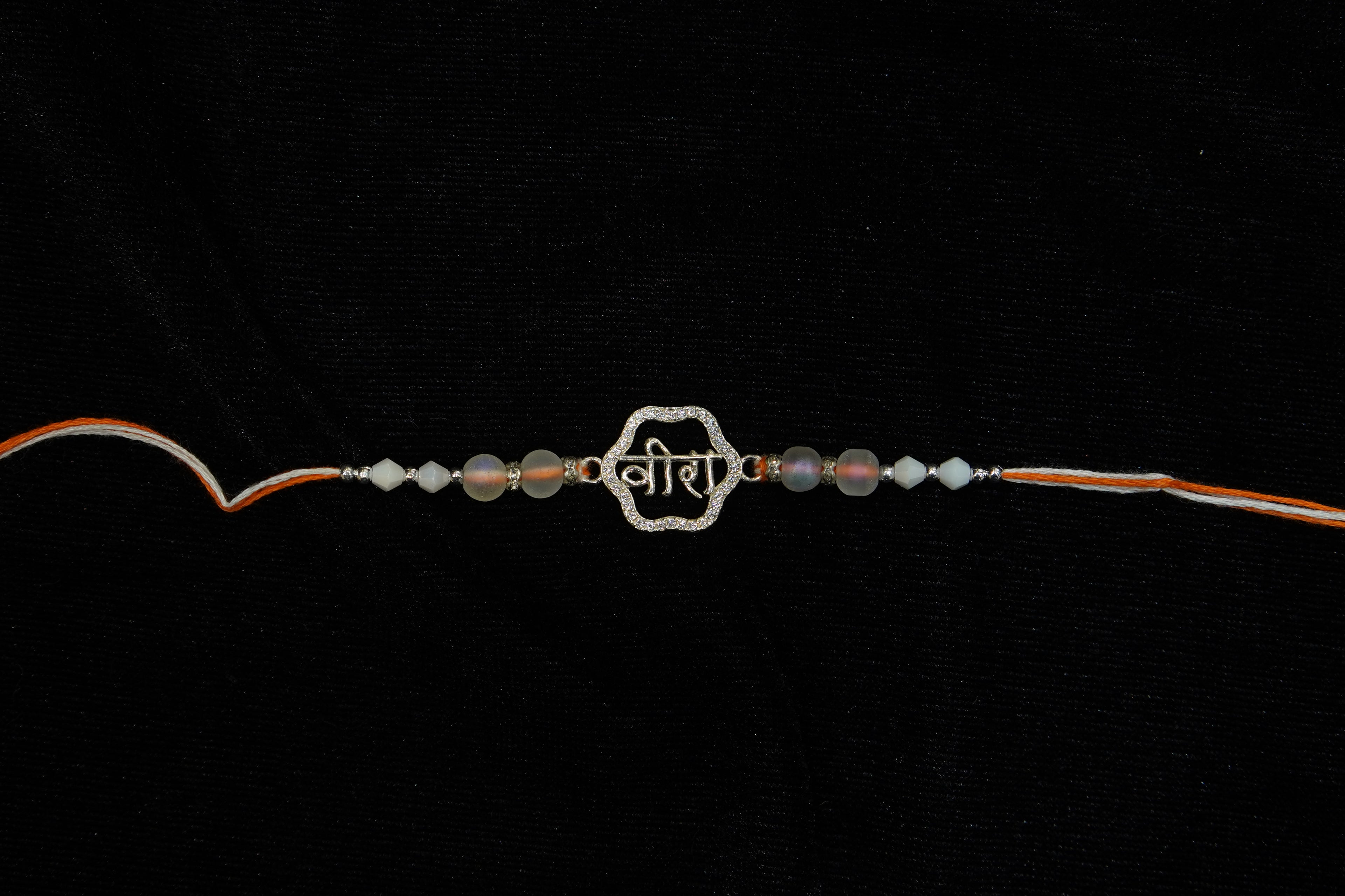 Silver Rakhi with Roli Chawal
