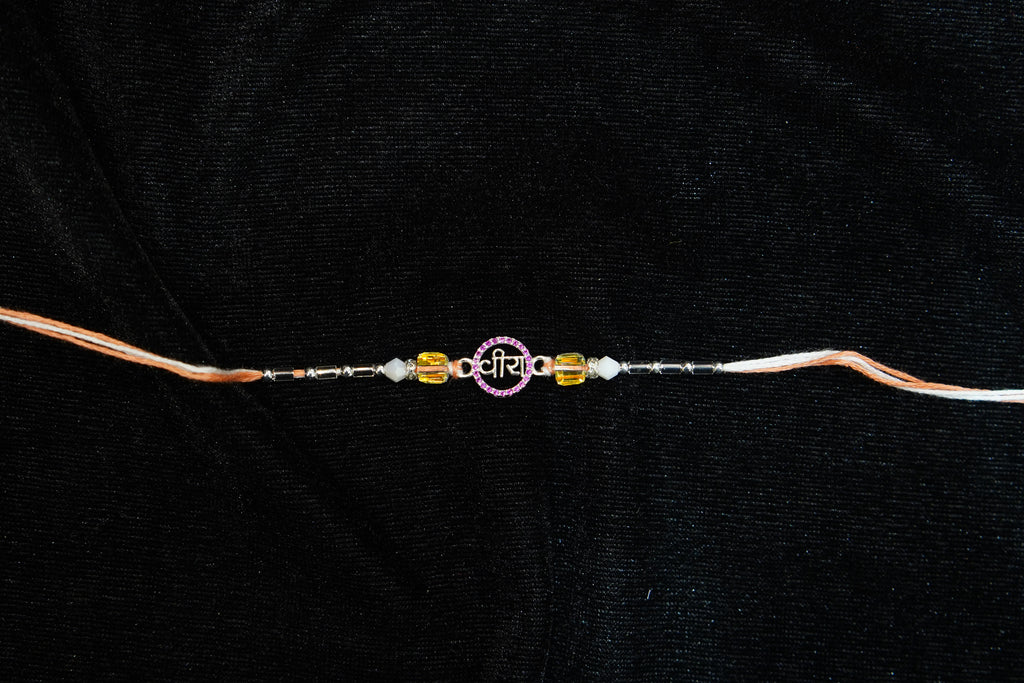 Silver Rakhi with Roli Chawal