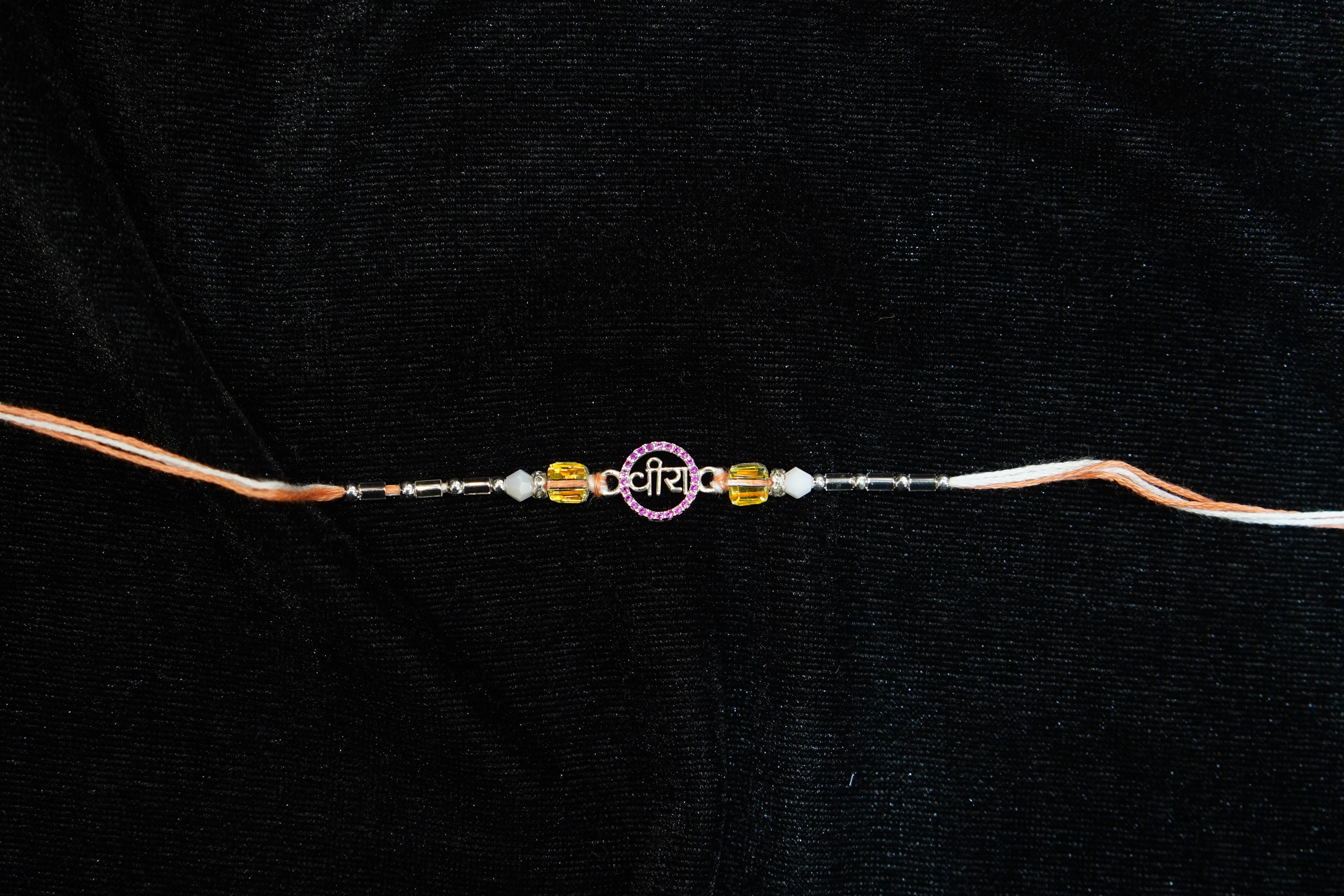 Silver Rakhi with Roli Chawal
