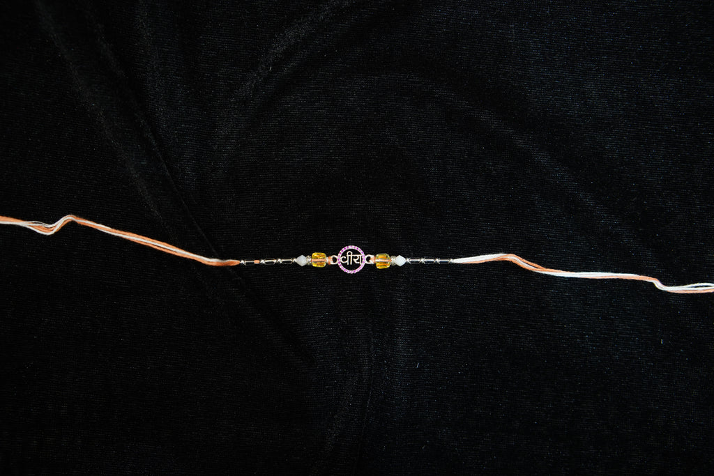 Silver Rakhi with Roli Chawal