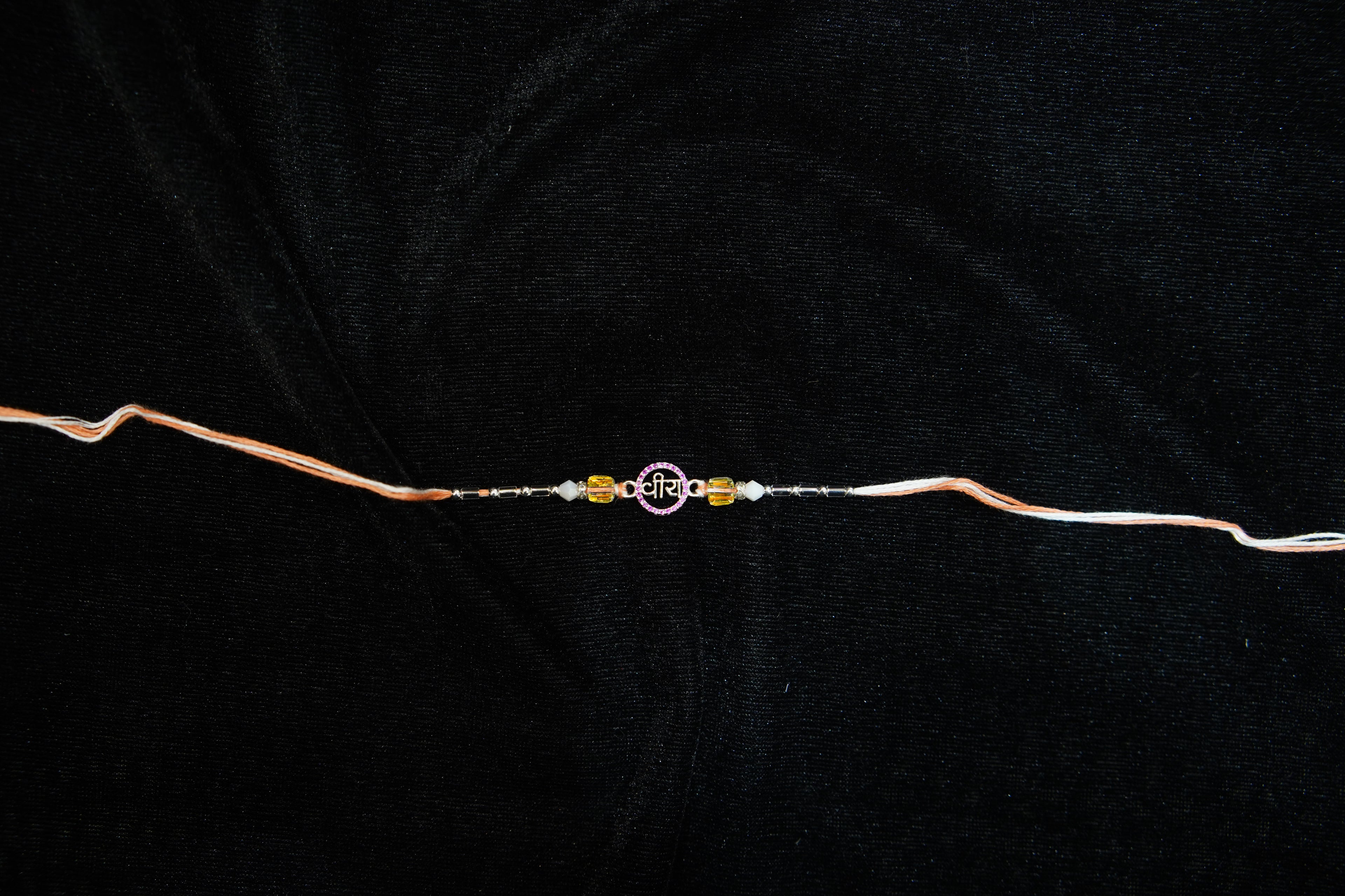 Silver Rakhi with Roli Chawal