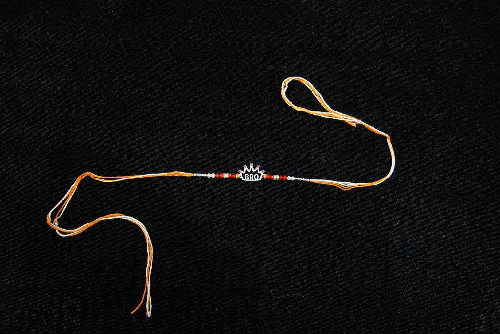 Silver Rakhi with Roli Chawal