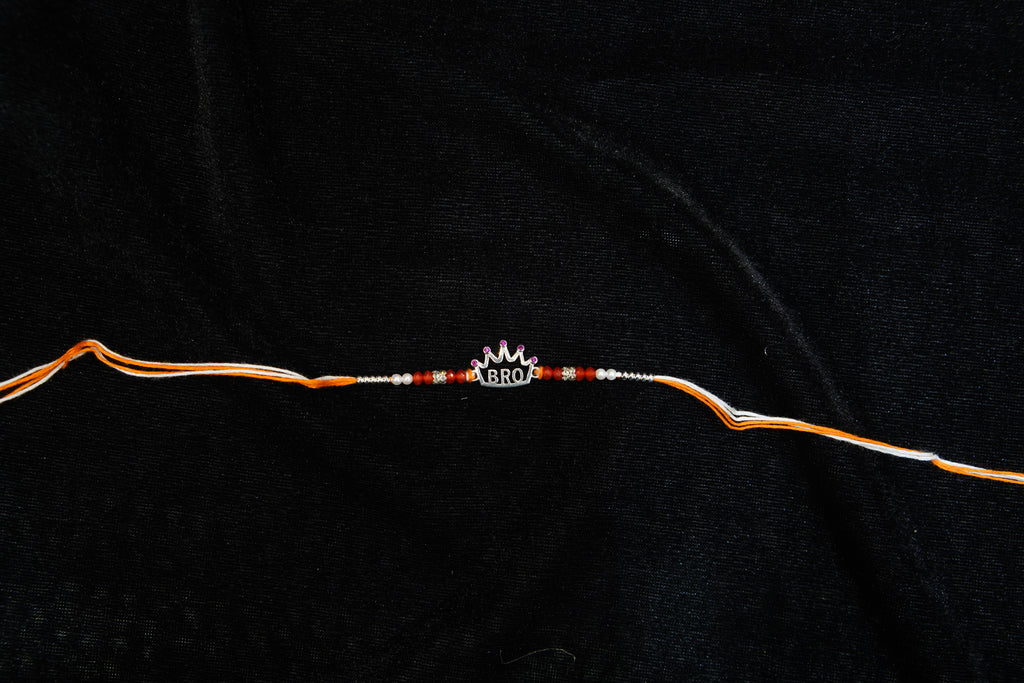 Silver Rakhi with Roli Chawal