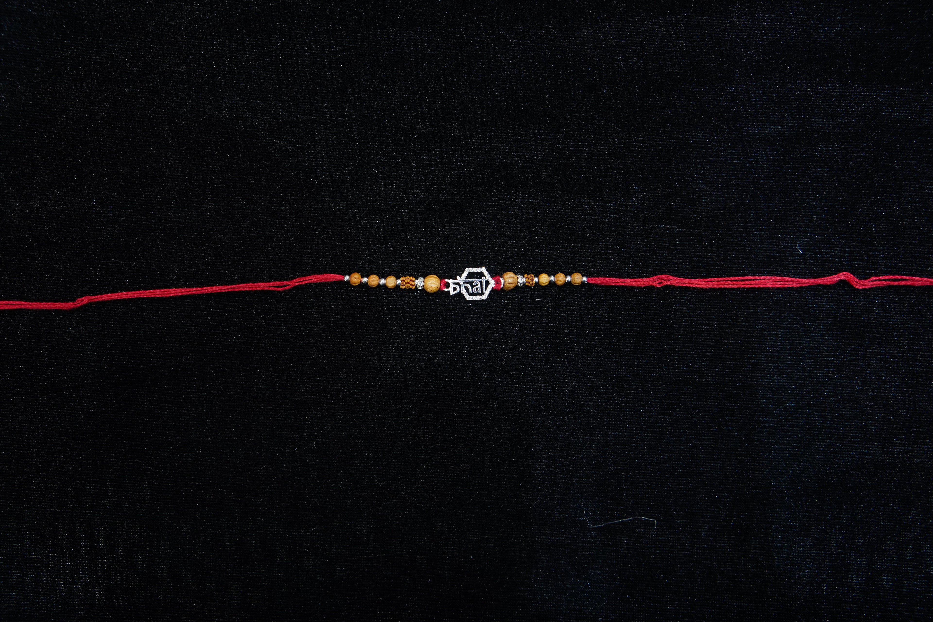 Silver Rakhi with Roli Chawal