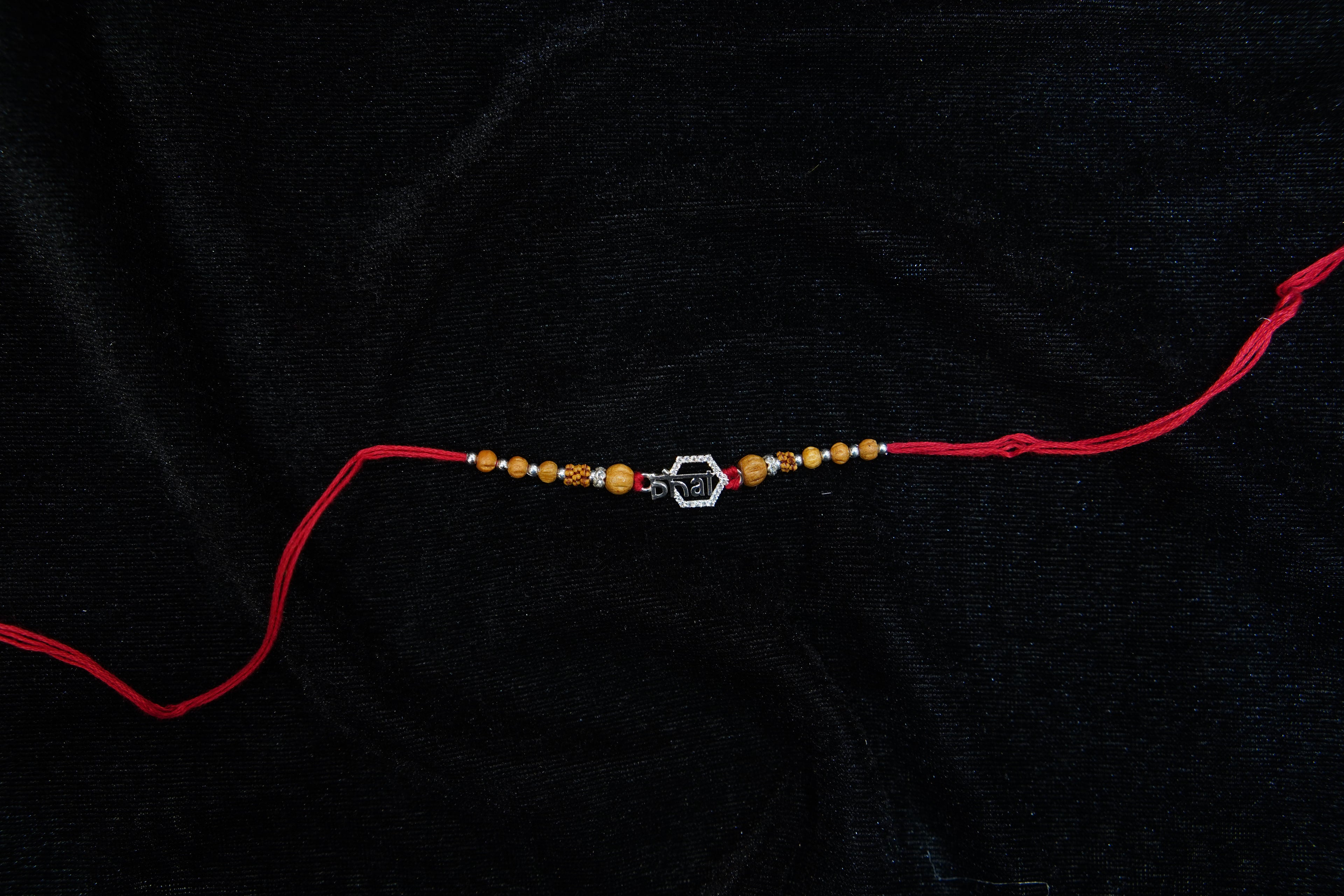 Silver Rakhi with Roli Chawal