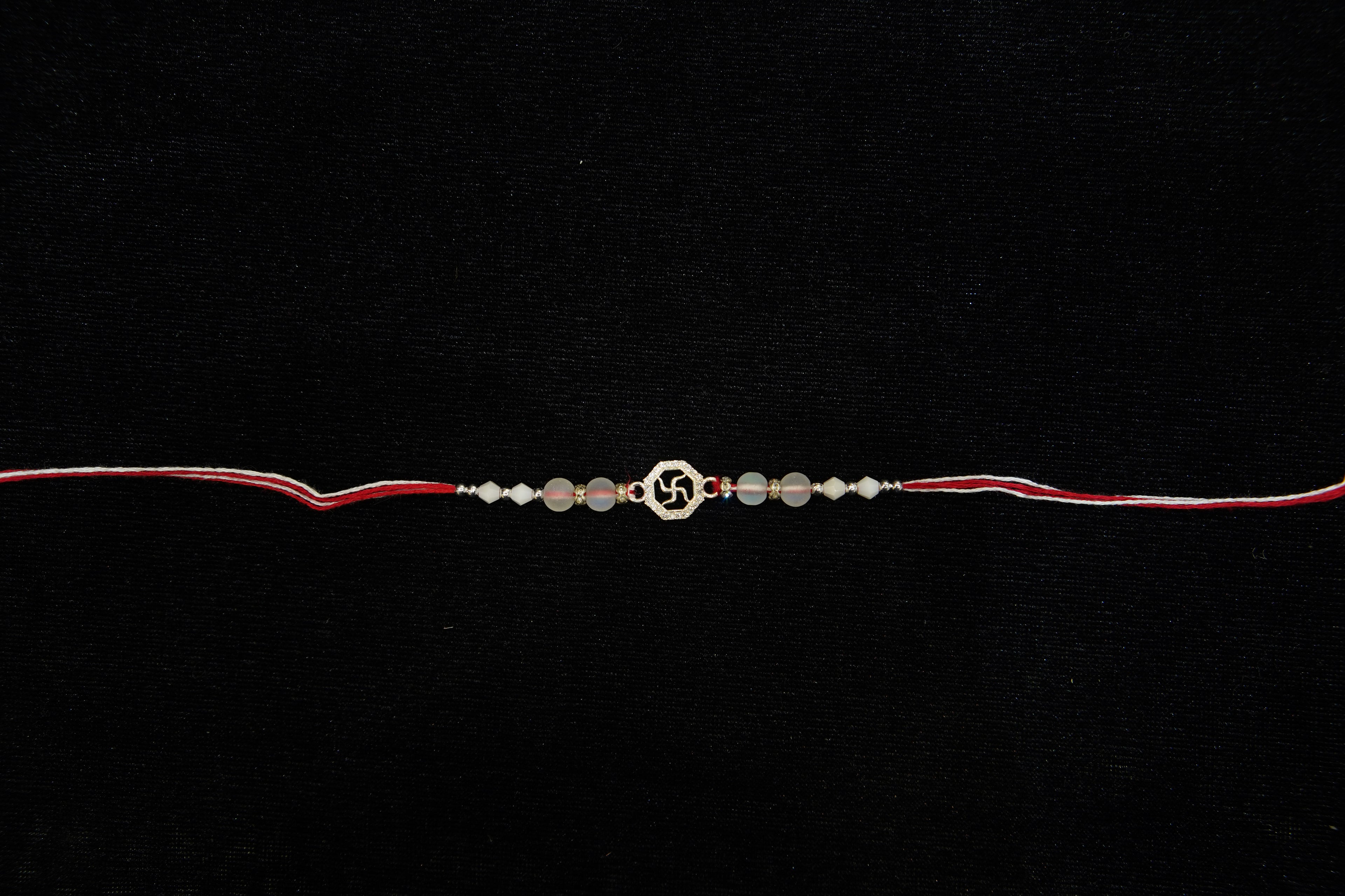 Silver Rakhi with Roli Chawal