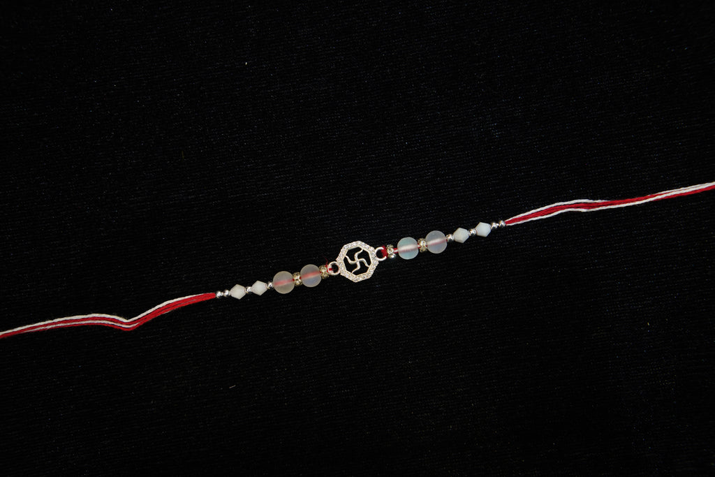 Silver Rakhi with Roli Chawal