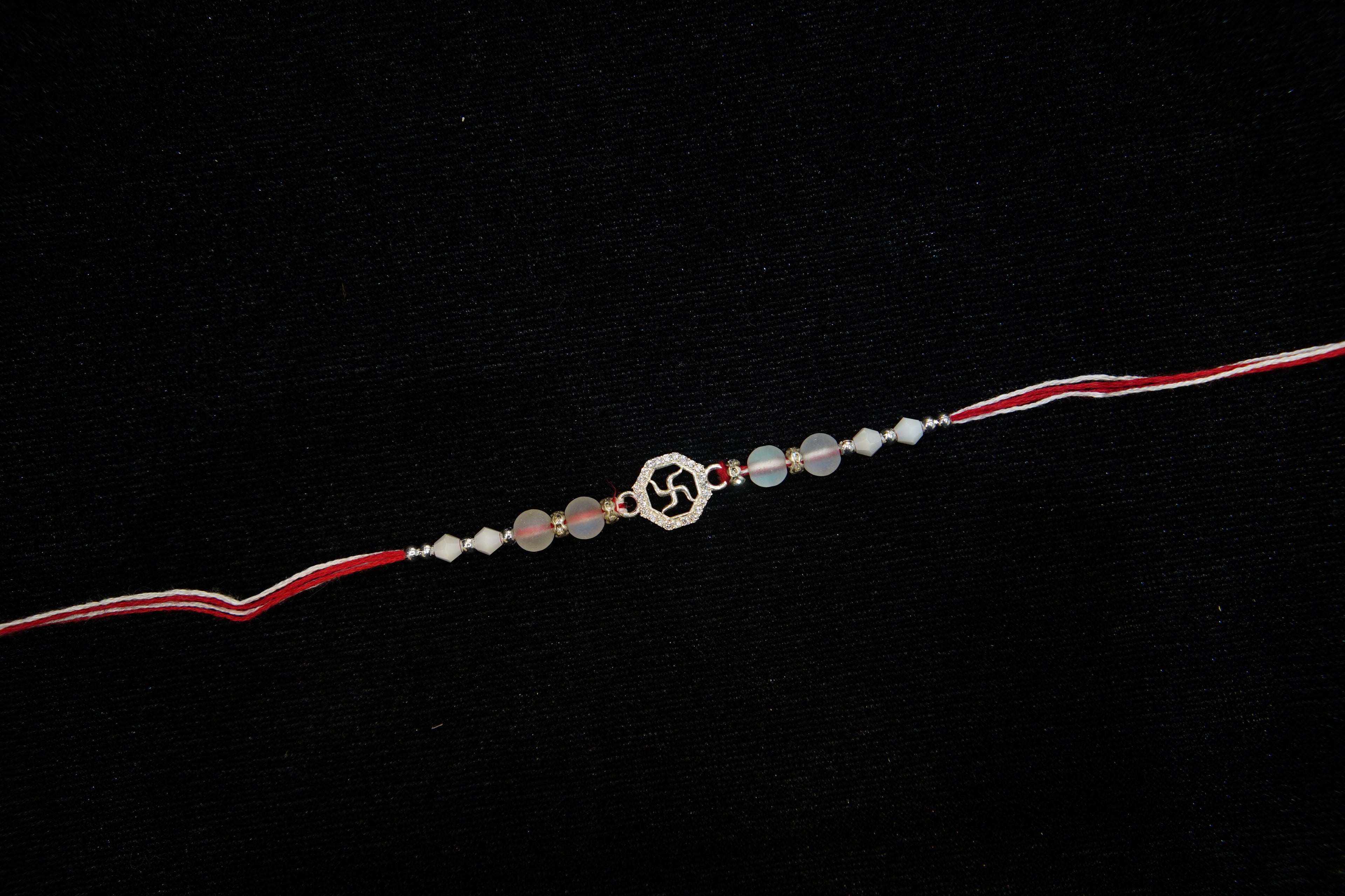 Silver Rakhi with Roli Chawal