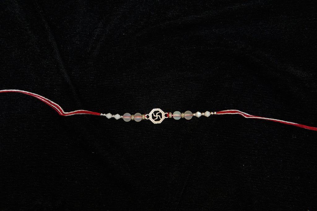 Silver Rakhi with Roli Chawal