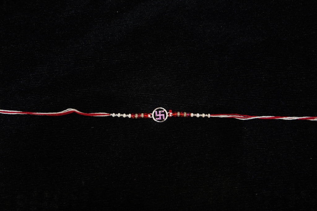Silver Rakhi with Roli Chawal