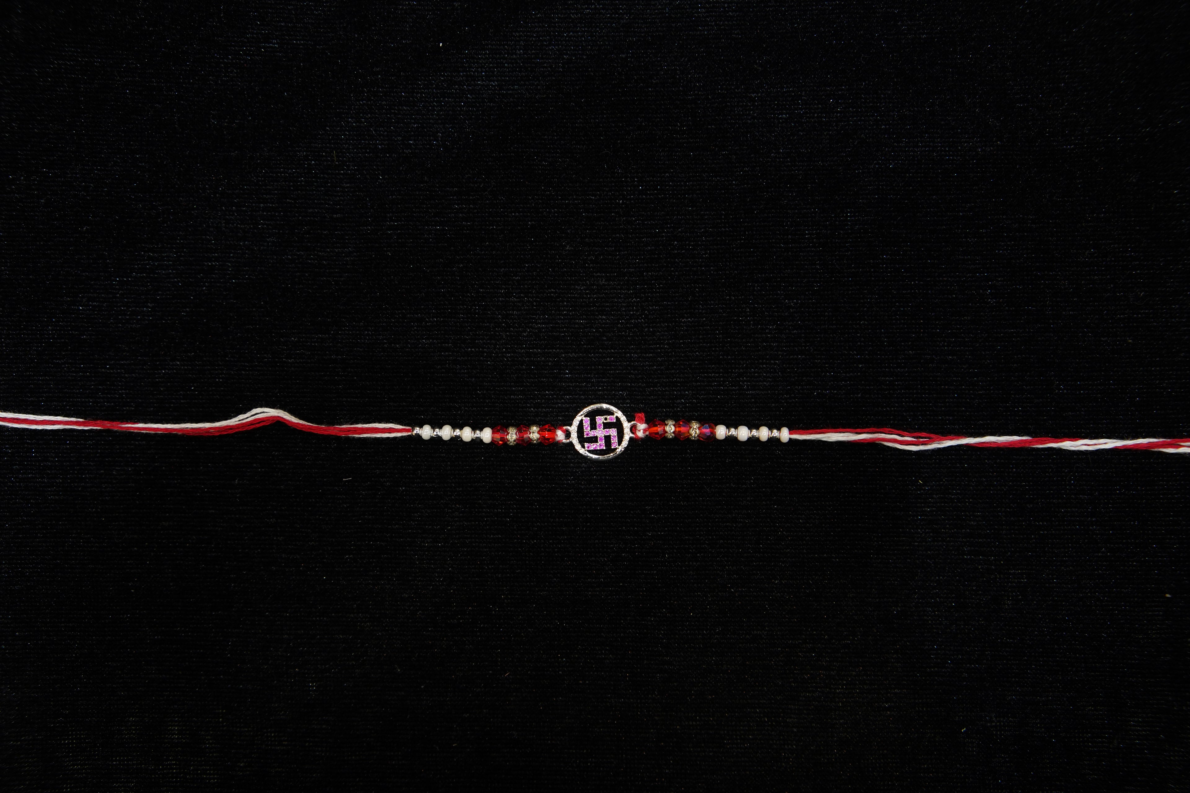 Silver Rakhi with Roli Chawal