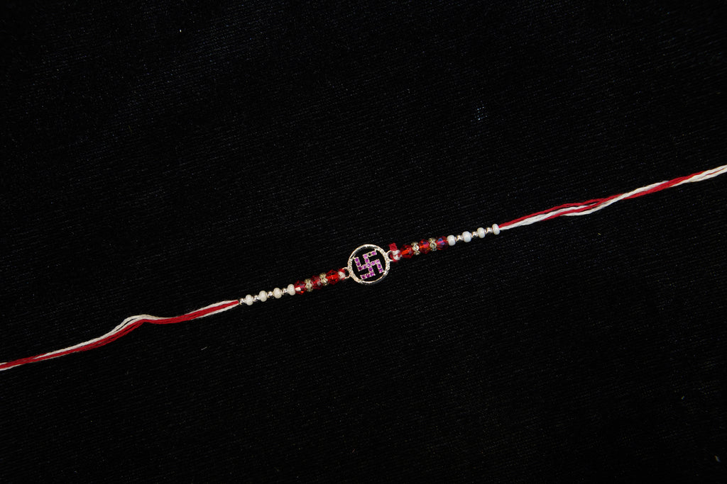 Silver Rakhi with Roli Chawal