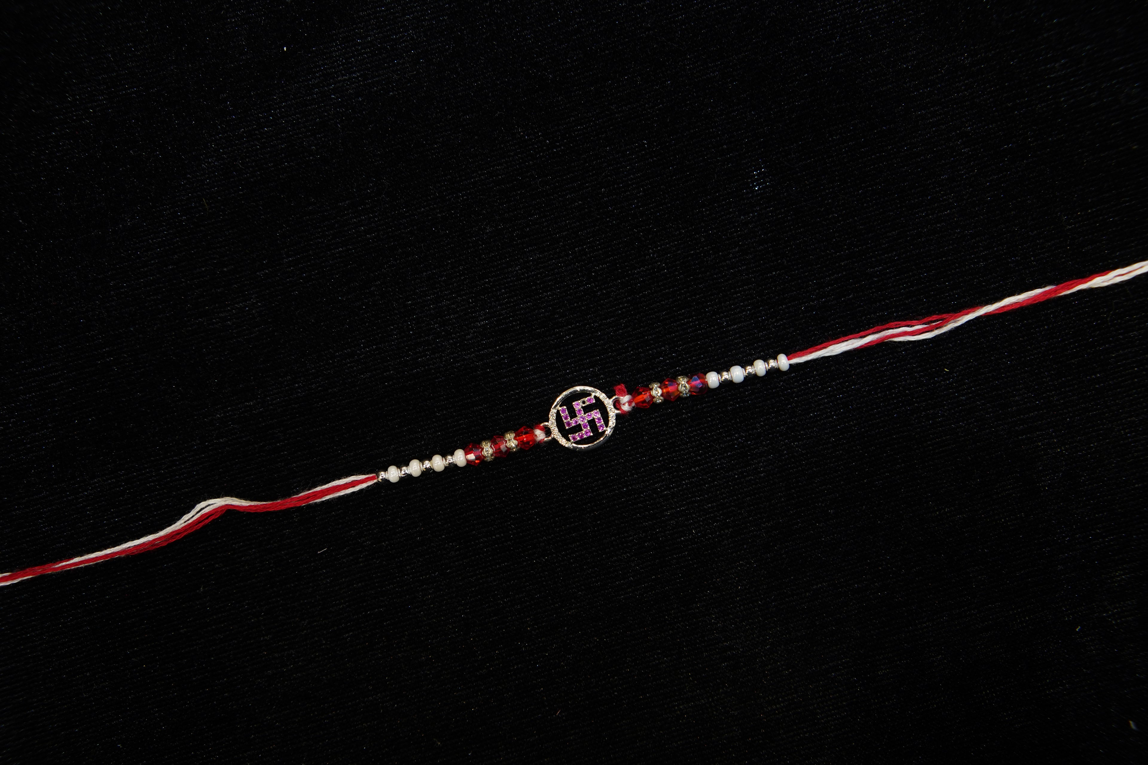 Silver Rakhi with Roli Chawal