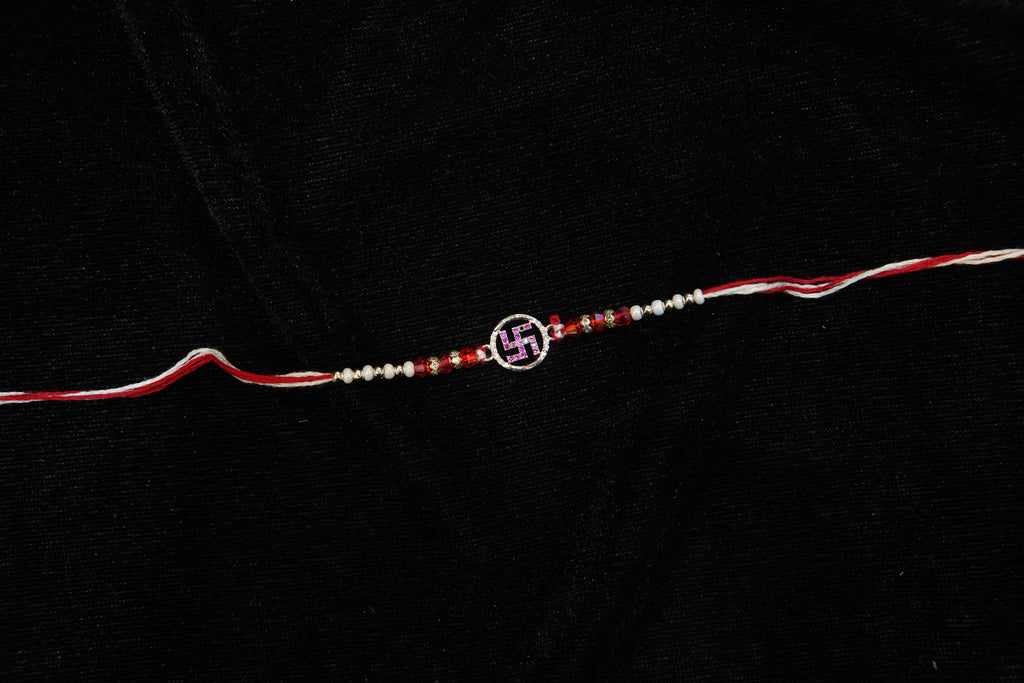 Silver Rakhi with Roli Chawal