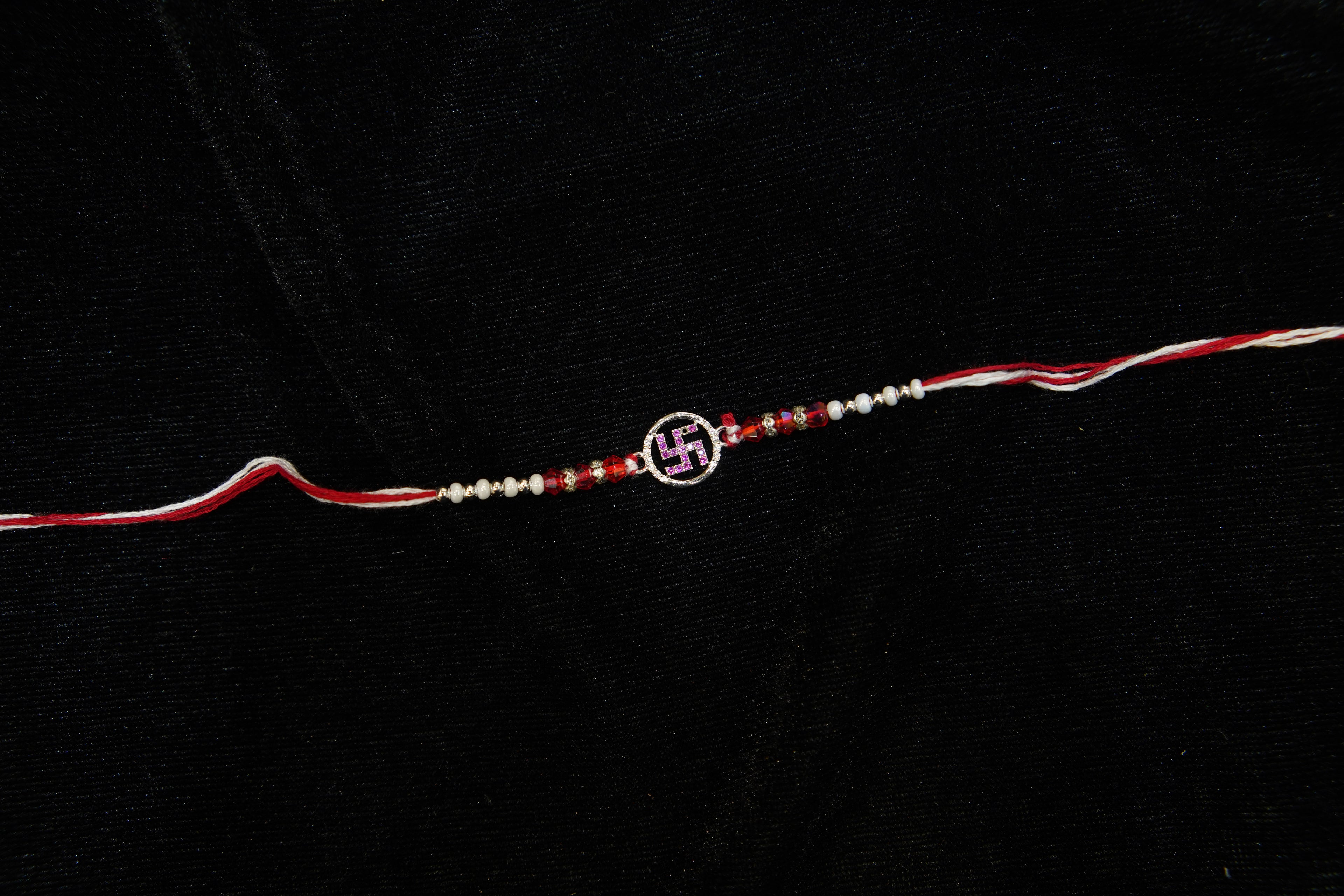 Silver Rakhi with Roli Chawal