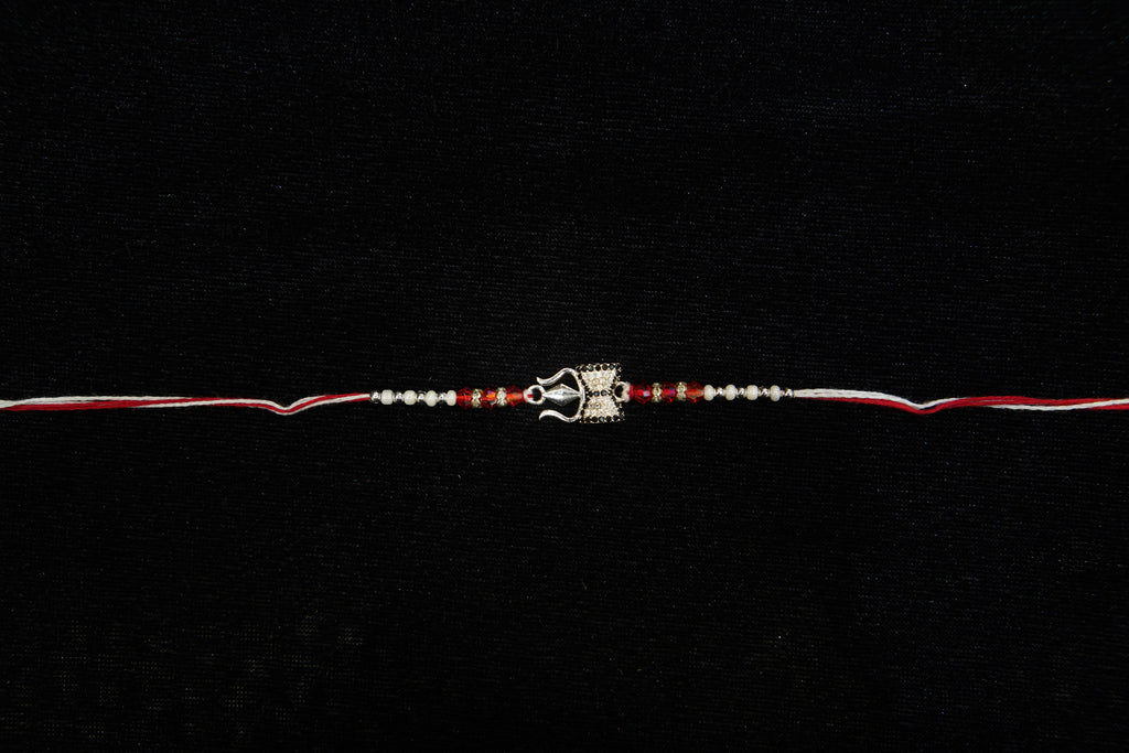 Silver Rakhi with Roli Chawal