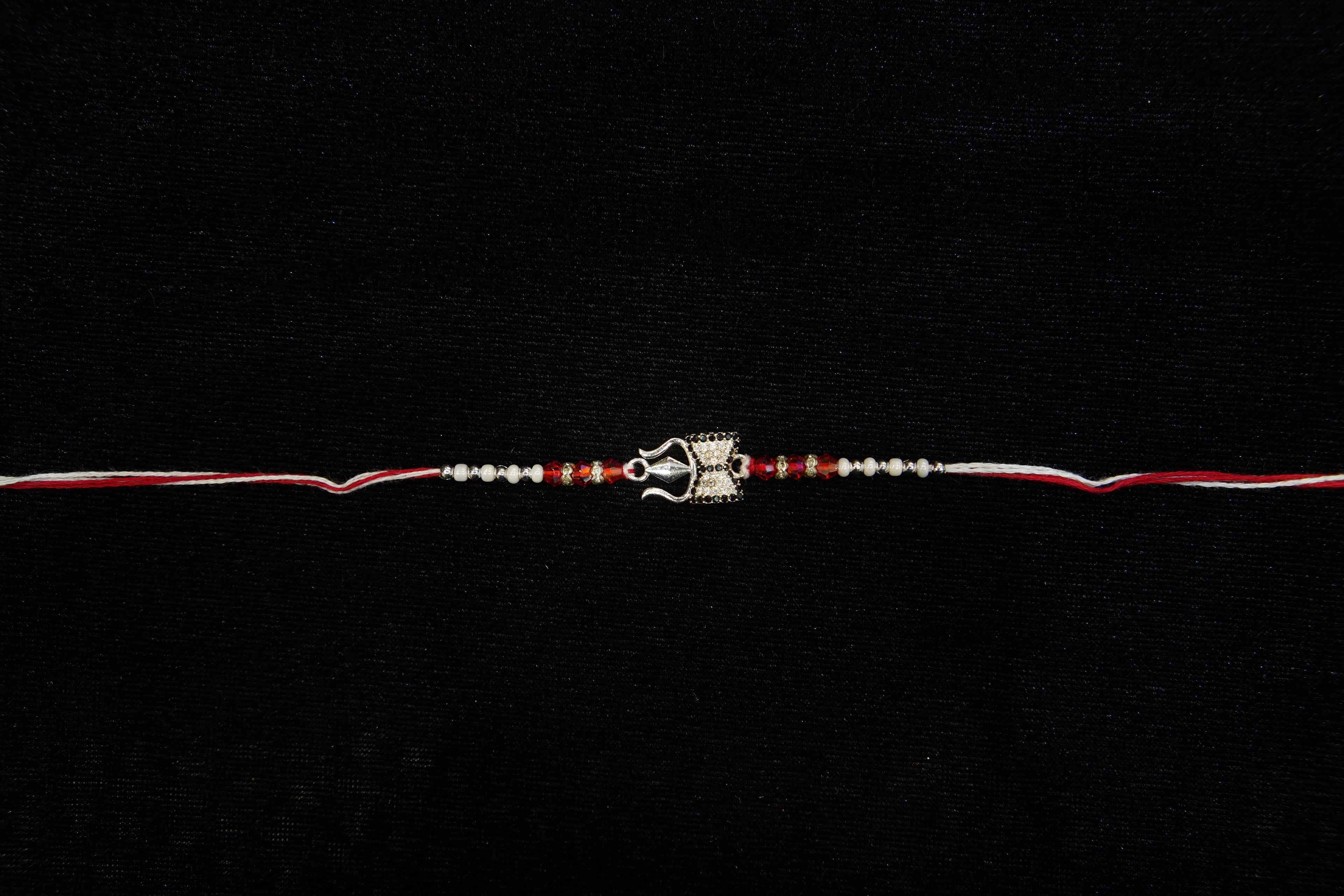 Silver Rakhi with Roli Chawal