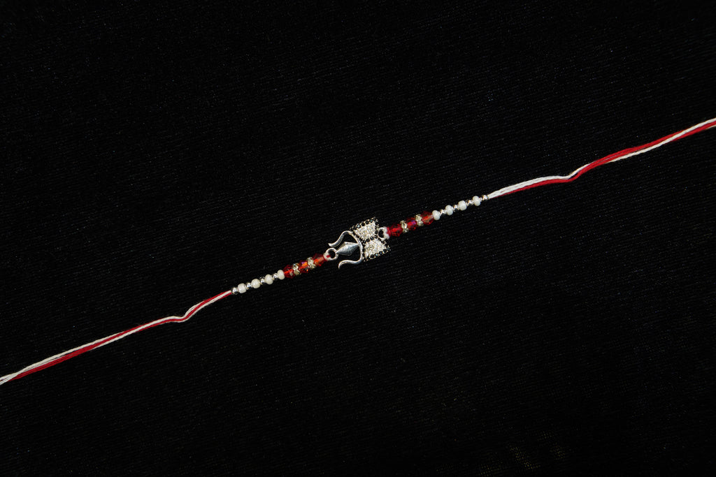 Silver Rakhi with Roli Chawal