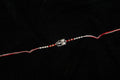 Silver Rakhi with Roli Chawal