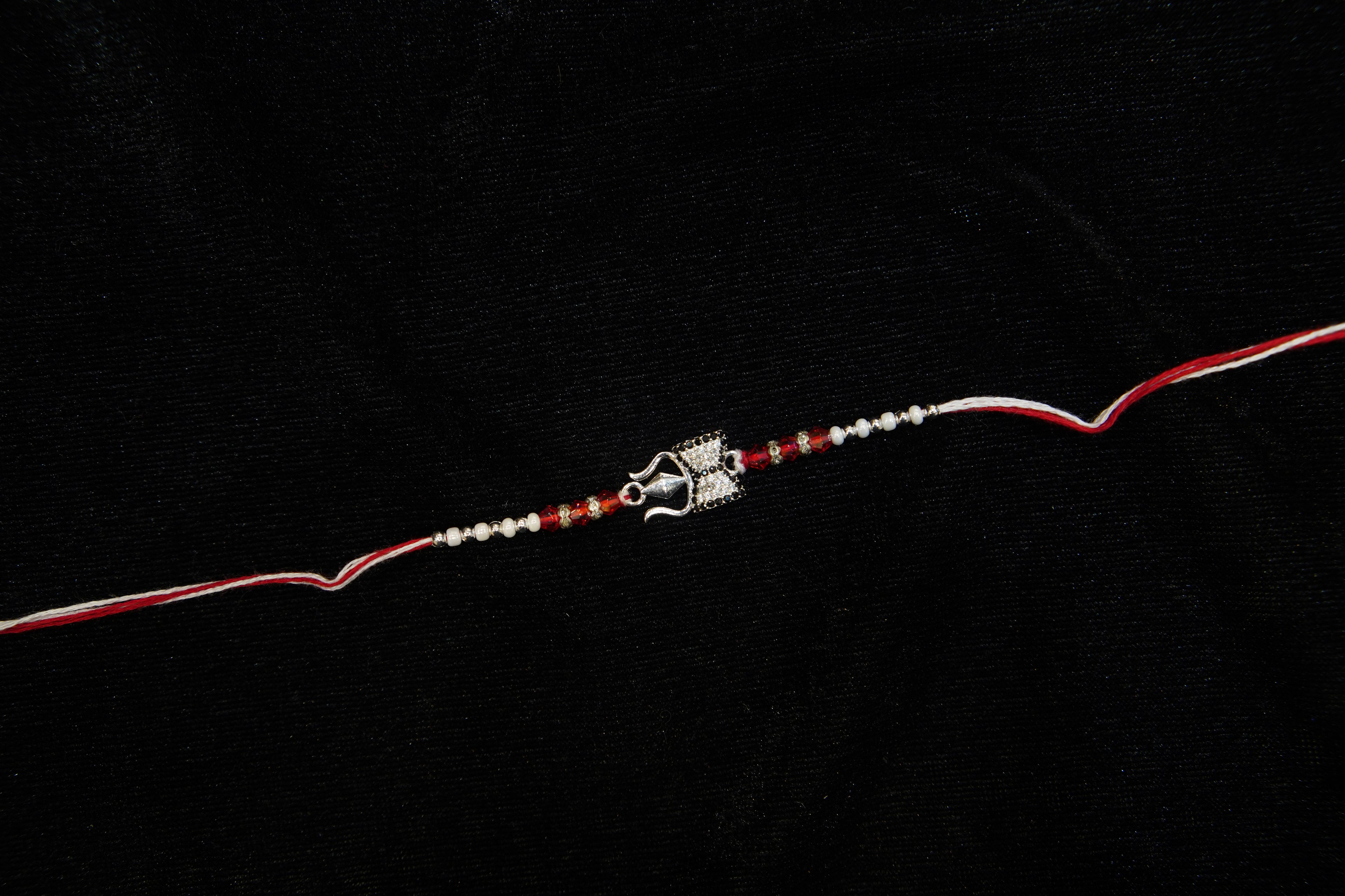 Silver Rakhi with Roli Chawal