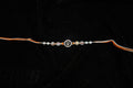 Silver Rakhi with Roli Chawal