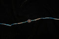 Silver Rakhi with Roli Chawal