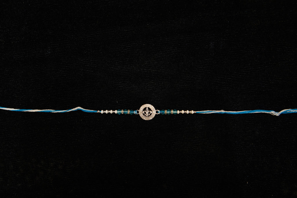 Silver Rakhi with Roli Chawal