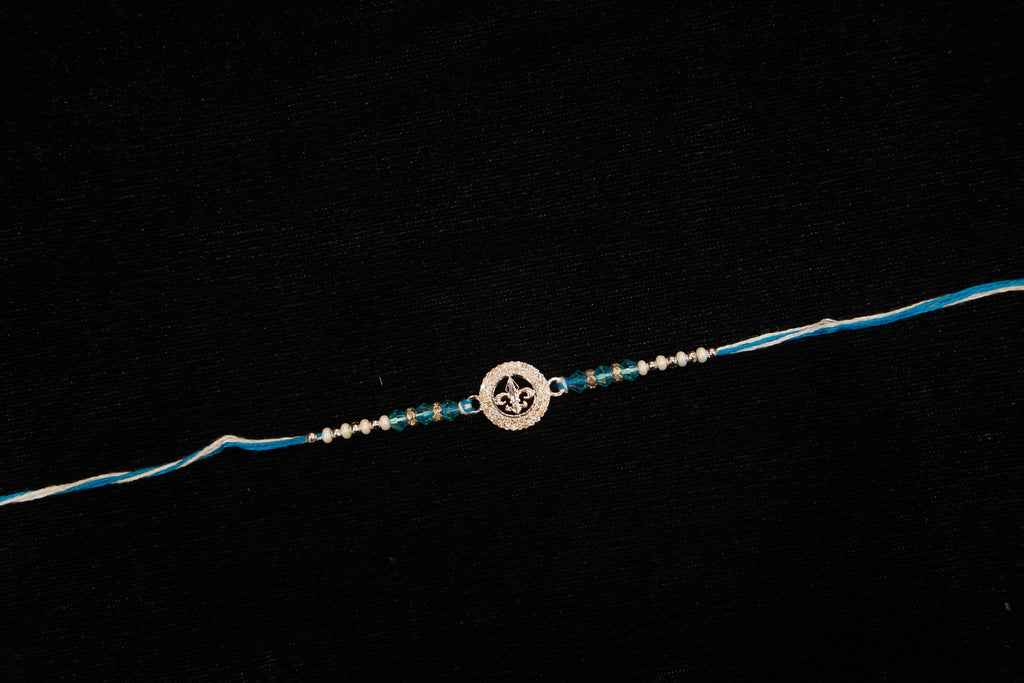 Silver Rakhi with Roli Chawal