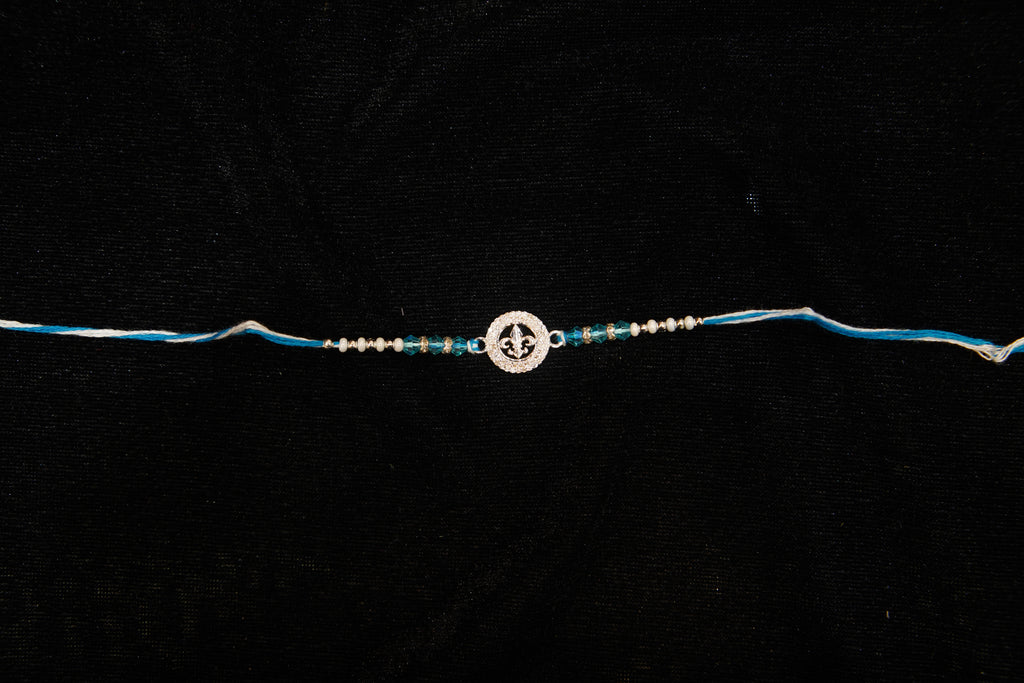 Silver Rakhi with Roli Chawal